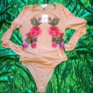 Sheer magic, roses cover me breasts